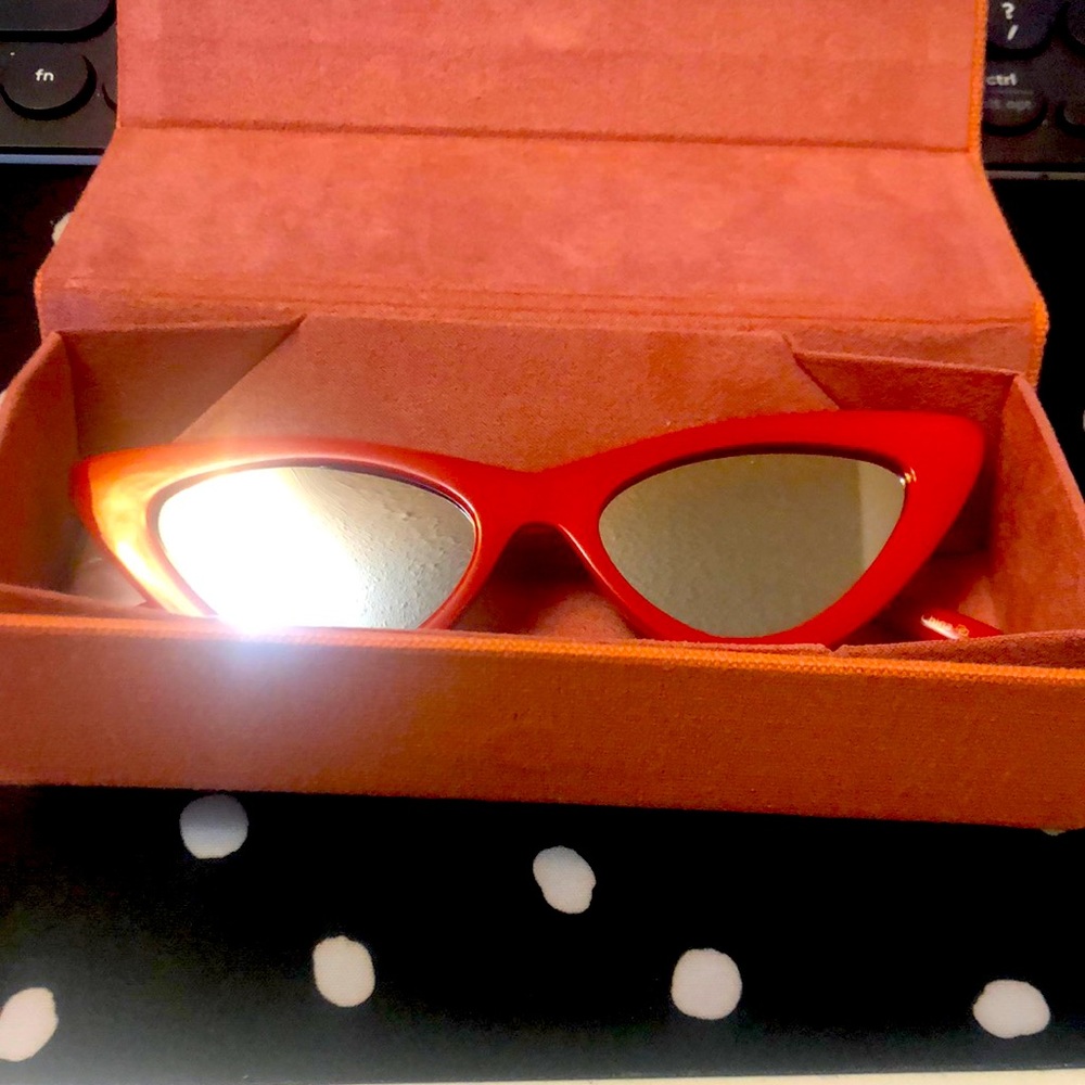 Leia by Valeria Lipovetsky sunglasses. Cat eye, red, dark tint.